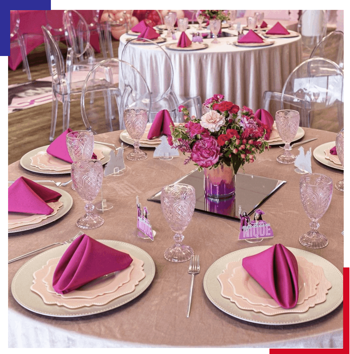 A table set with plates, napkins and glasses.